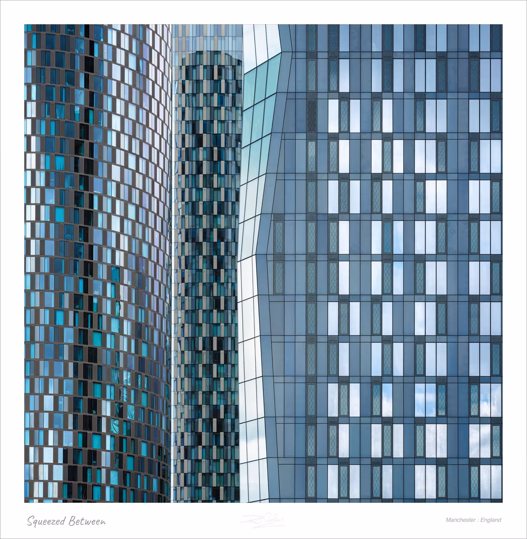 Squeezed Between — Manchester : England